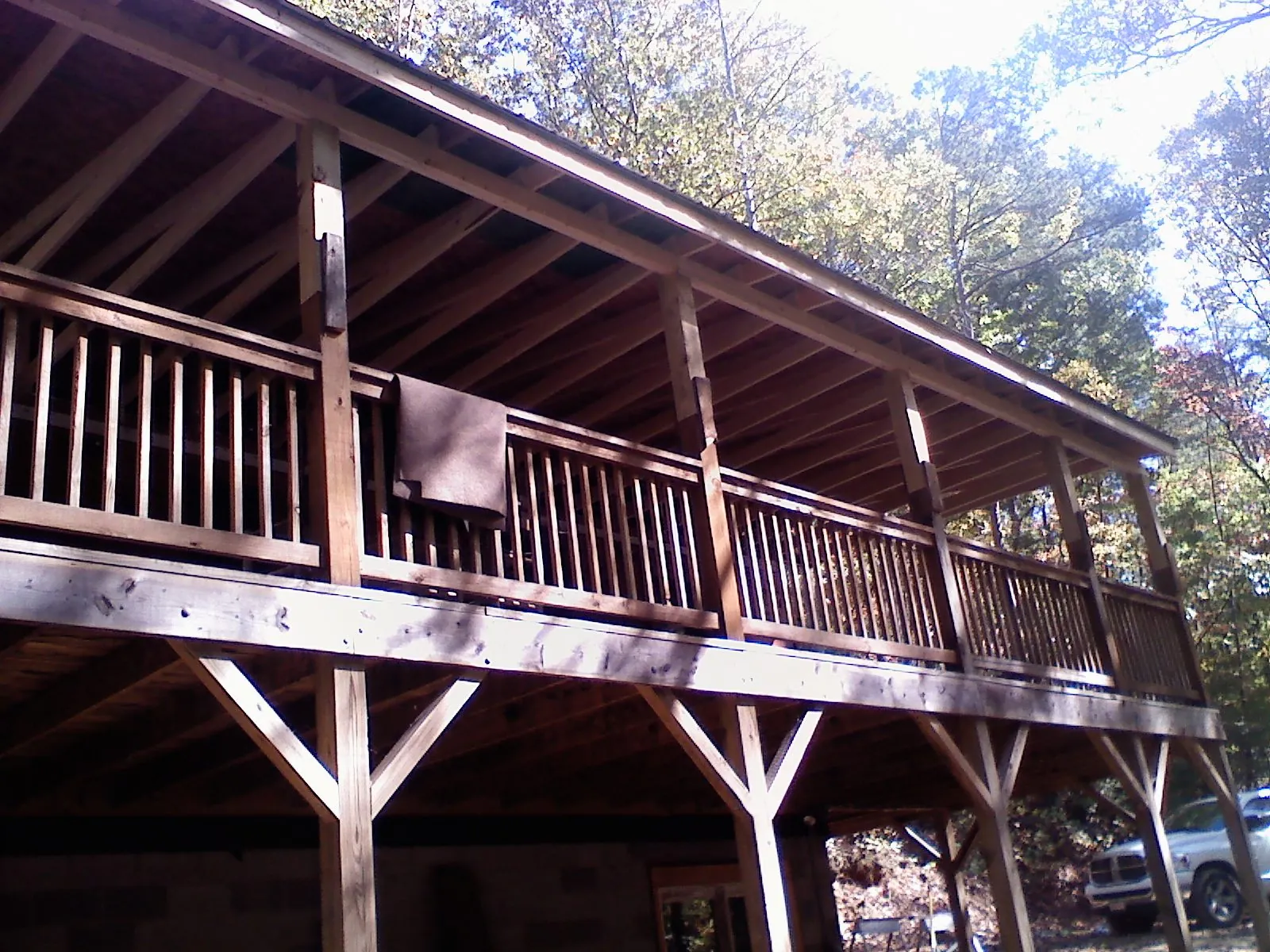 Timber framing under a new elevated porch and deck — Roof Leak Repair in Tekoa by Roofing Brothers